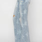 RISEN Mid Rise Button Fly Start Print Flare Jeans